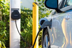 An electric car charging in California